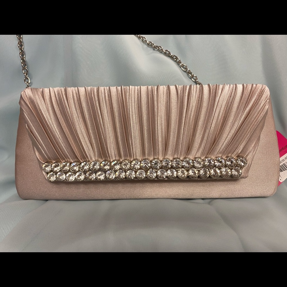 Blush colored clutch bag